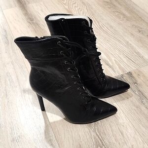 Black crocodile heeled boot